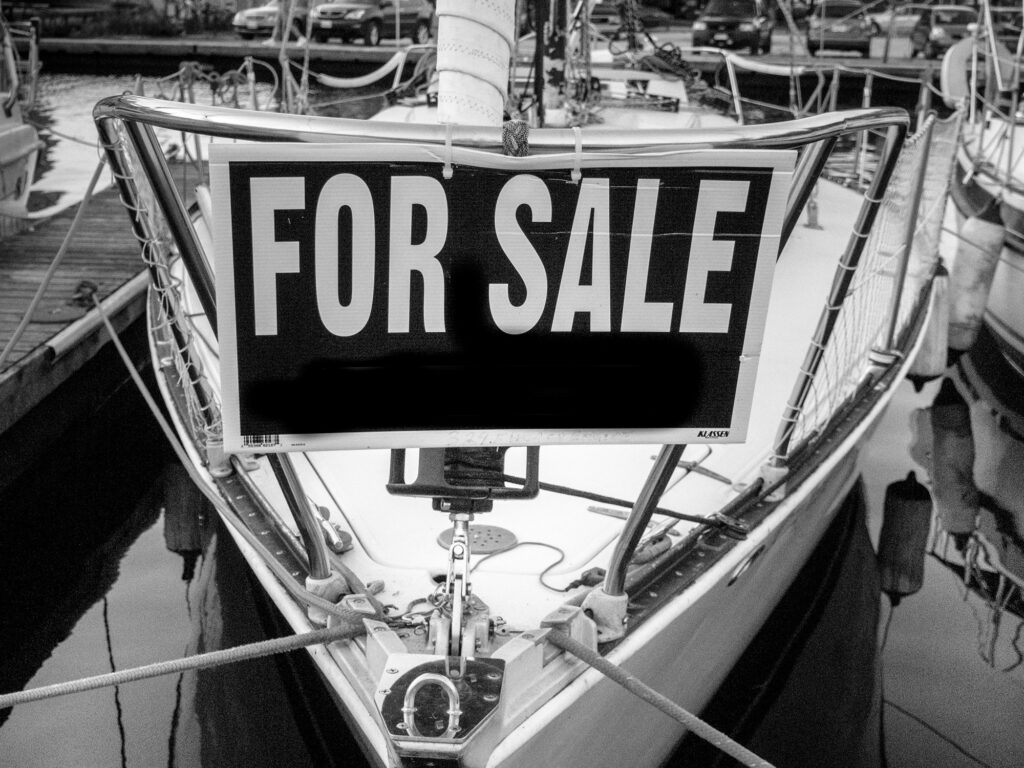 View of moored boat on lake for sale, Toronto, Canada
