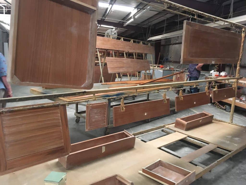 Teak doors and cabinets ready for the spray booth.
