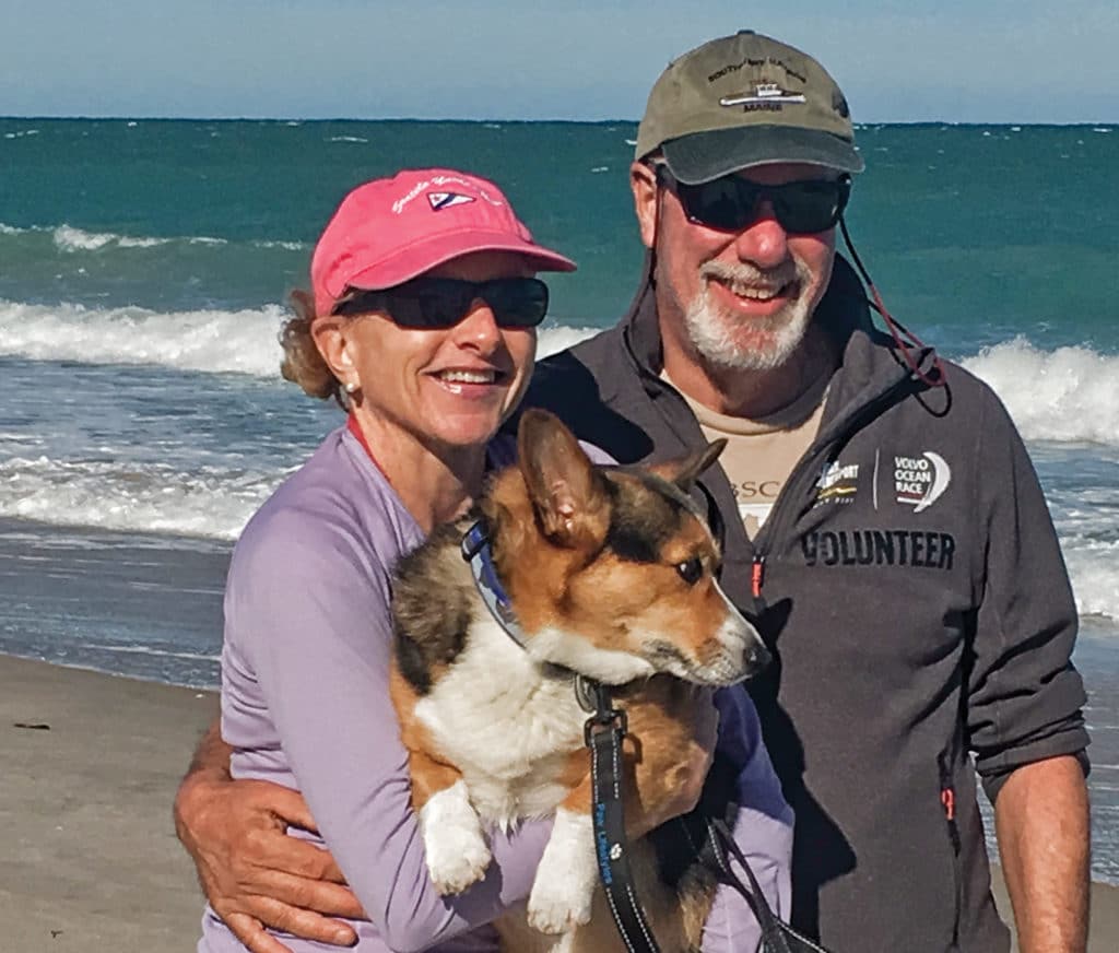 Stewie the corgi with his owners.