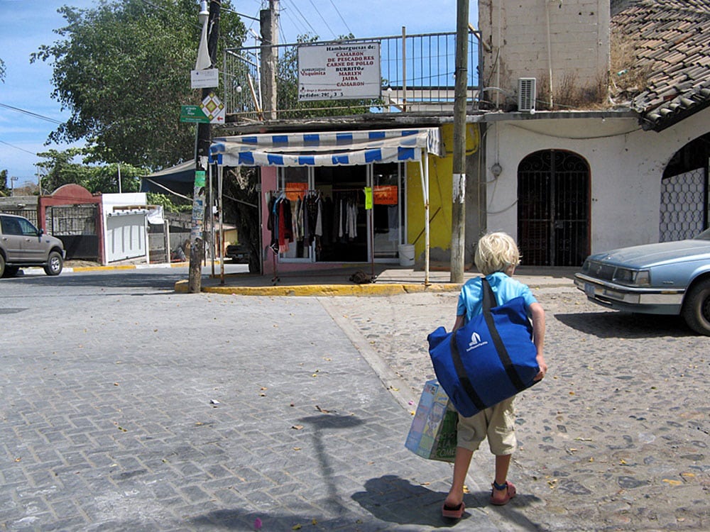 Niall carrying groceries in Mexico