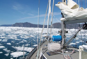 sailing boat in frozen waters