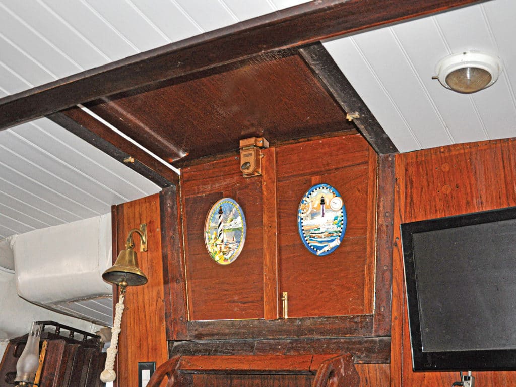 Glass panels of Florida lighthouses set into the doors