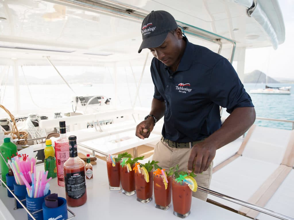 Moorings crew member making Bloody Marys