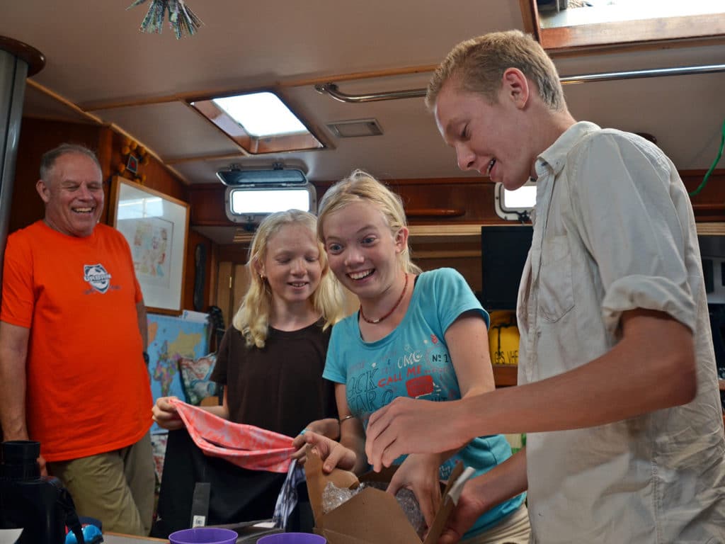 excited children opening package