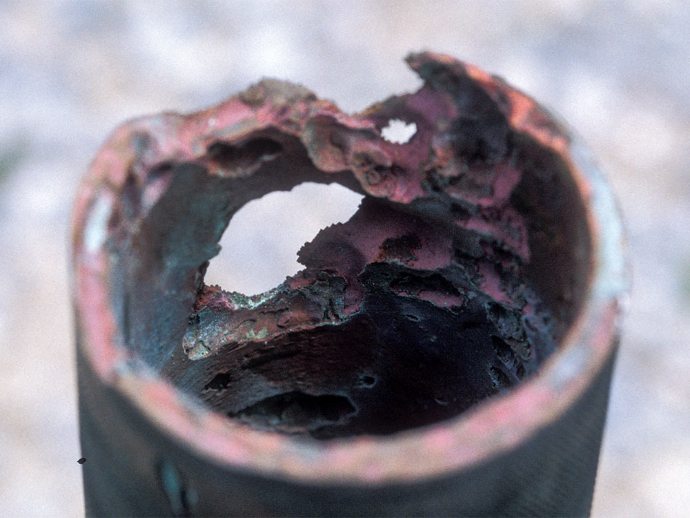 corroded metal shaft log