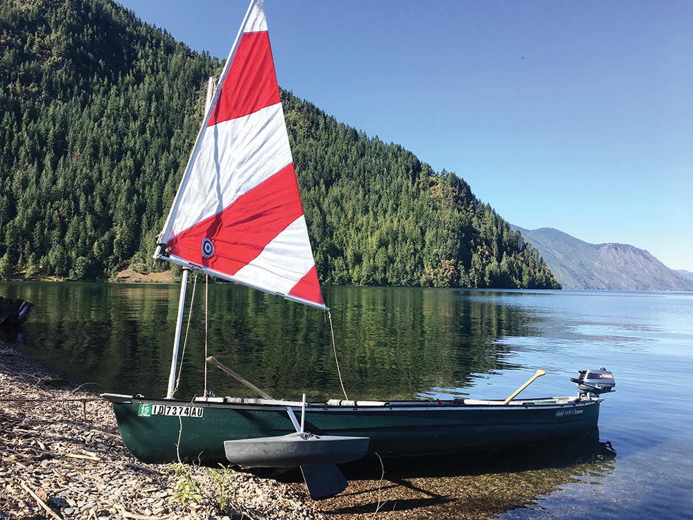 15-foot canoe rigged for sailing