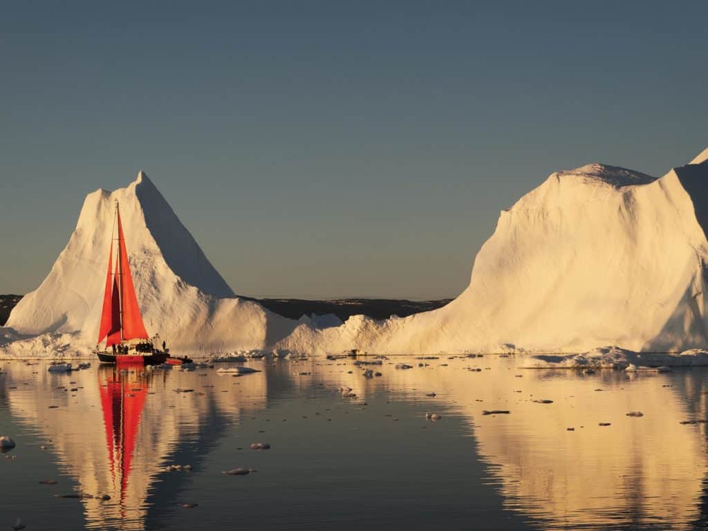 Sailing near icebergs in Disko Bay