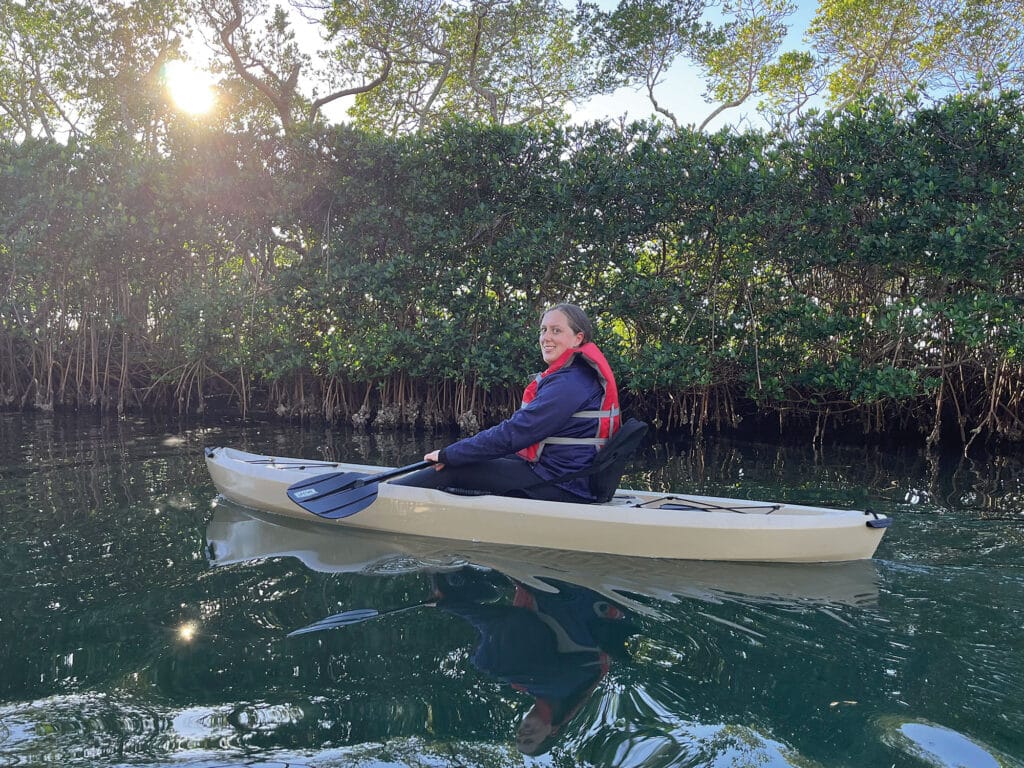 Maggie kayaking in the mangroves