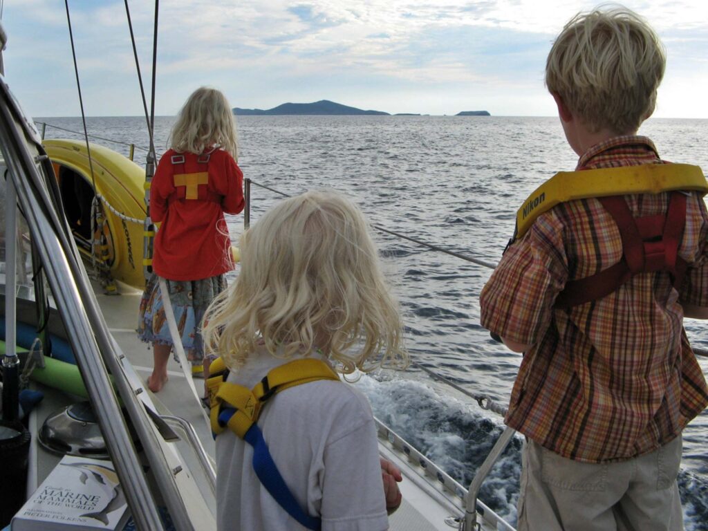 Children looking out for whales