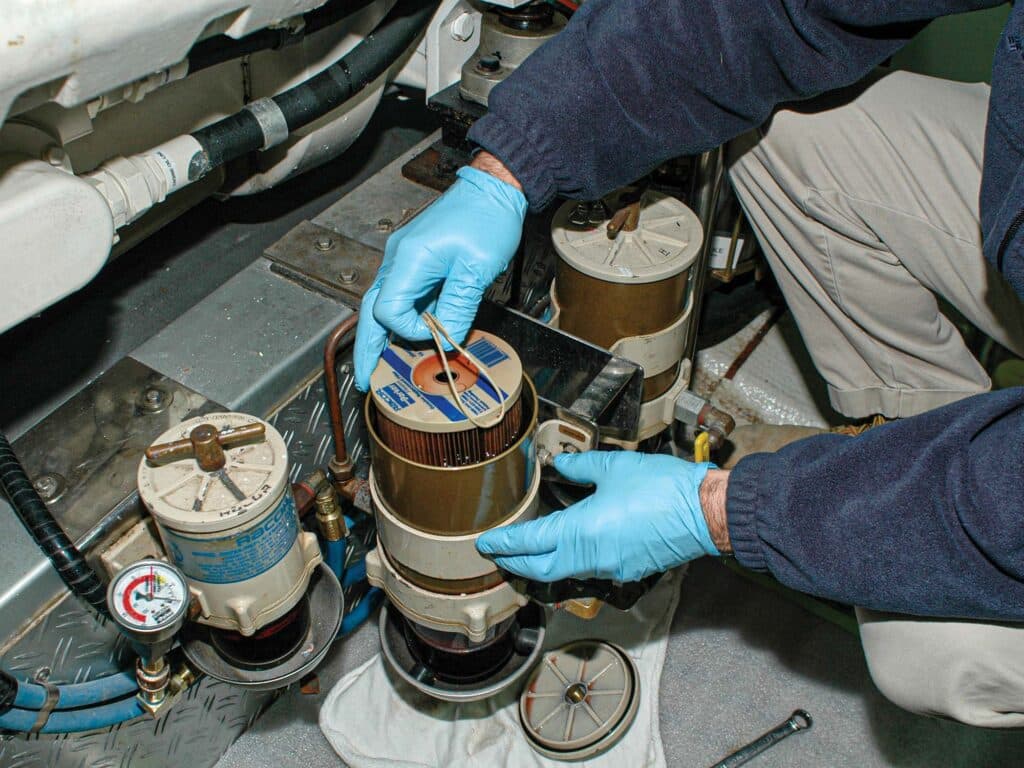 Servicing a primary filter