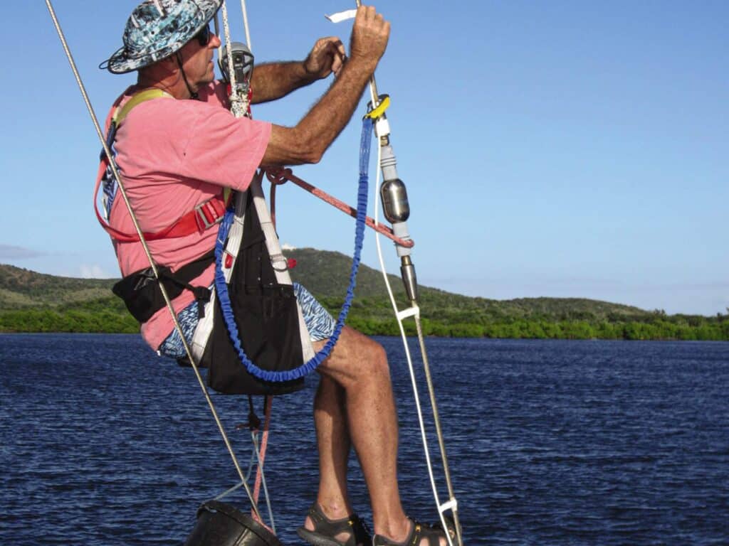 Author doing rigging on their sailboat