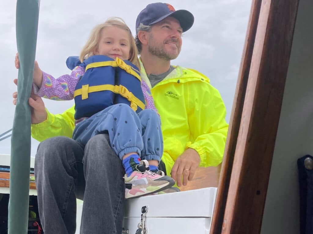 Father and daughter sailing