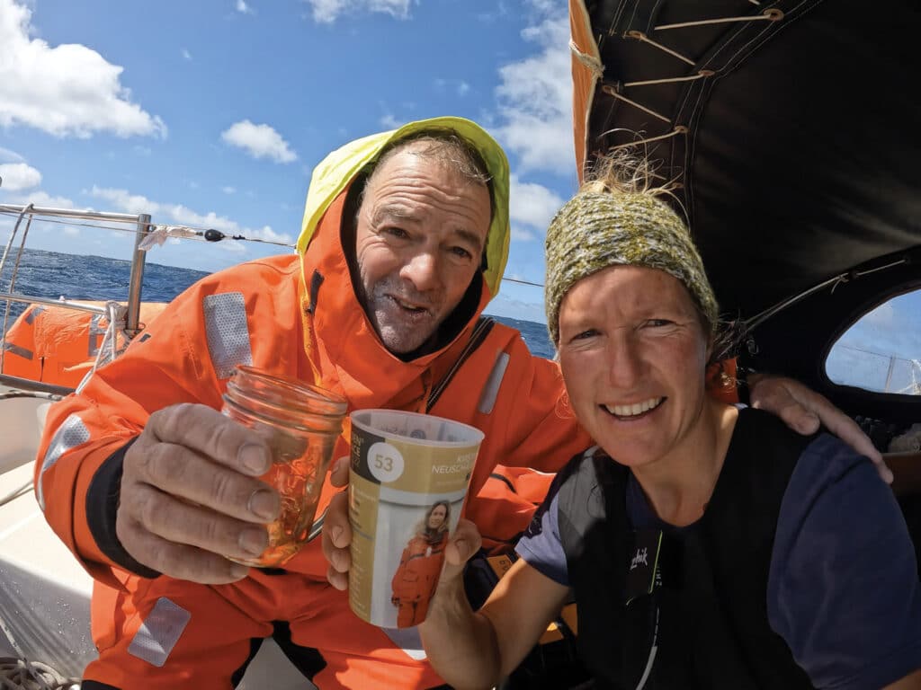 Neuschäfer and Lehtinen with glasses of rum