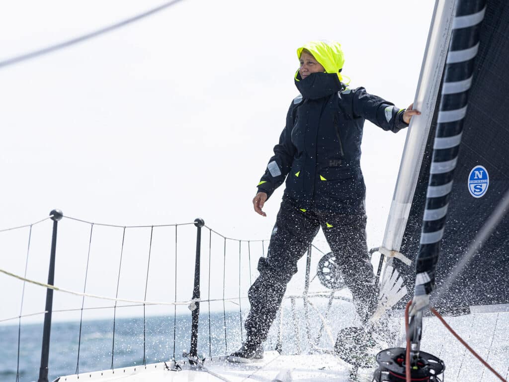 Yachtswomen Pip Hare shown here training onboard her IMOCA Open60 race yacht