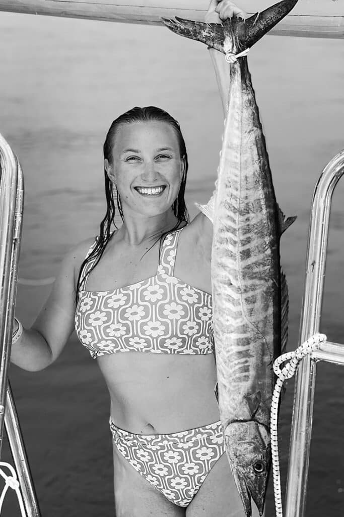 Ren with a wahoo fish that she's caught