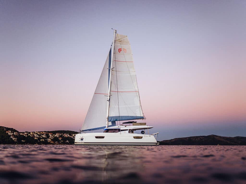 Sailboat on the water at dusk