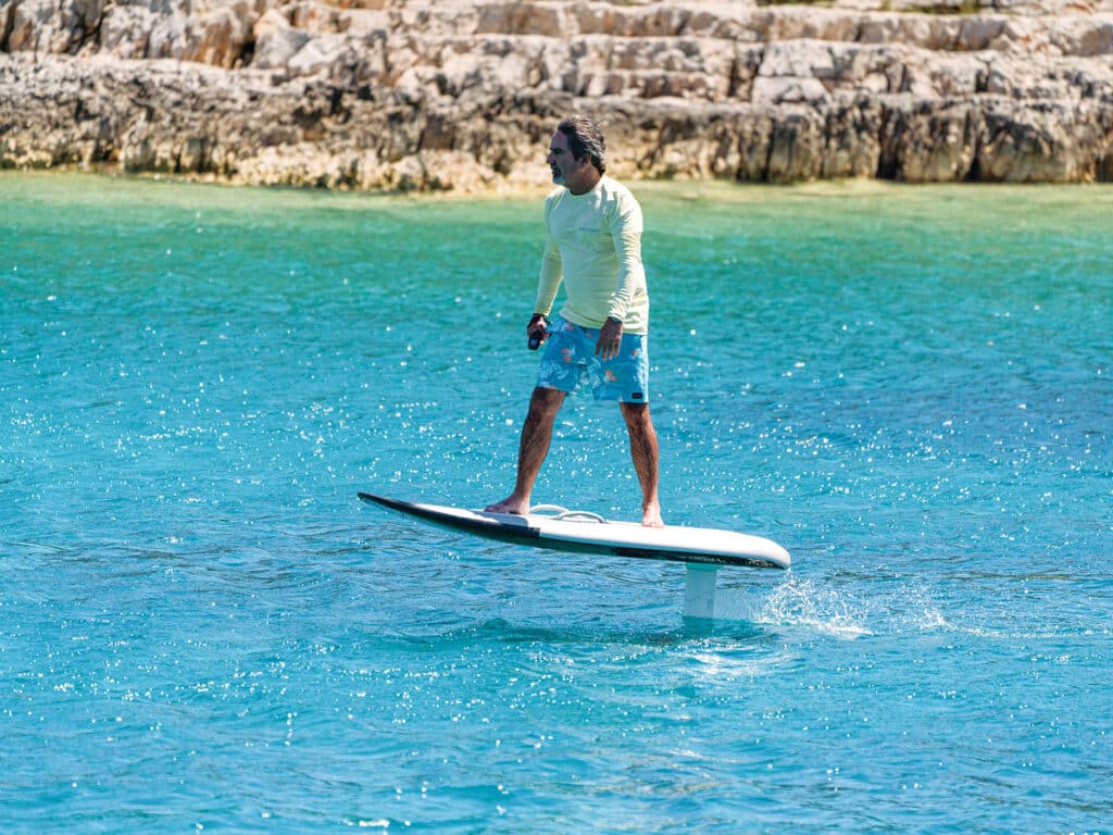 man foiling on the water