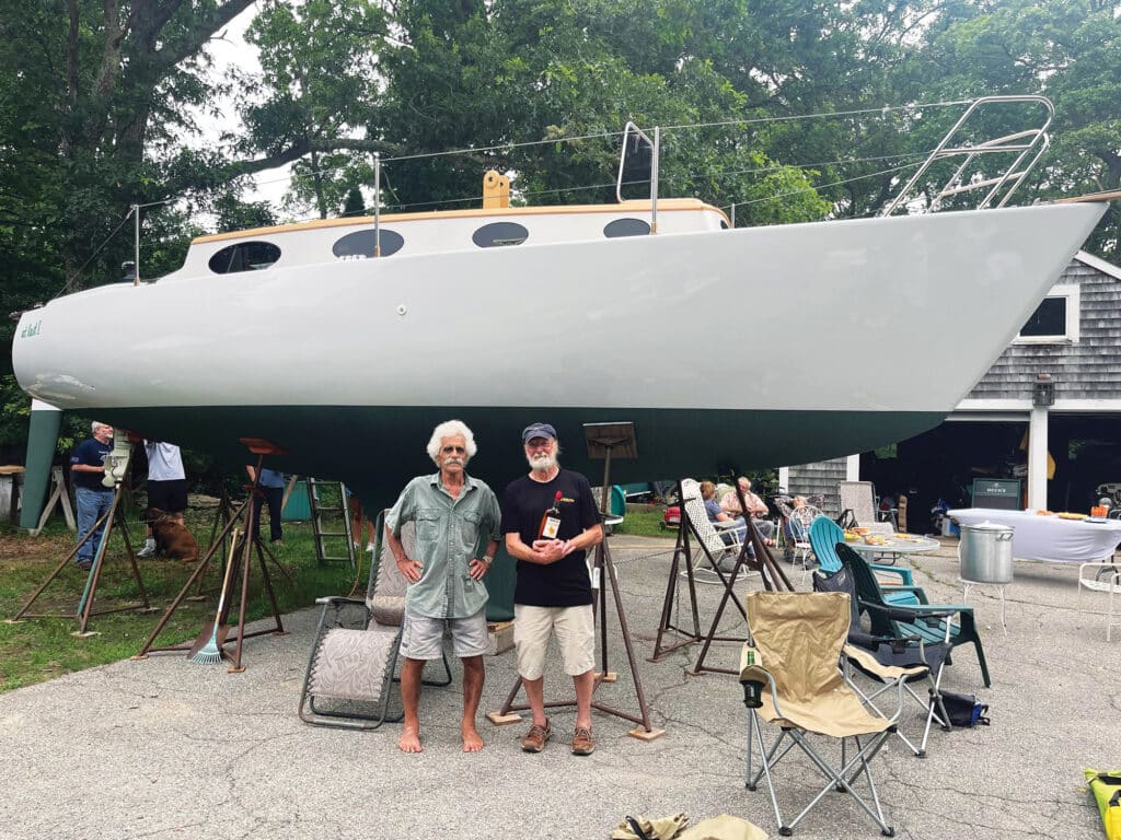Danny Greene and Jud Chase with the boat in progress