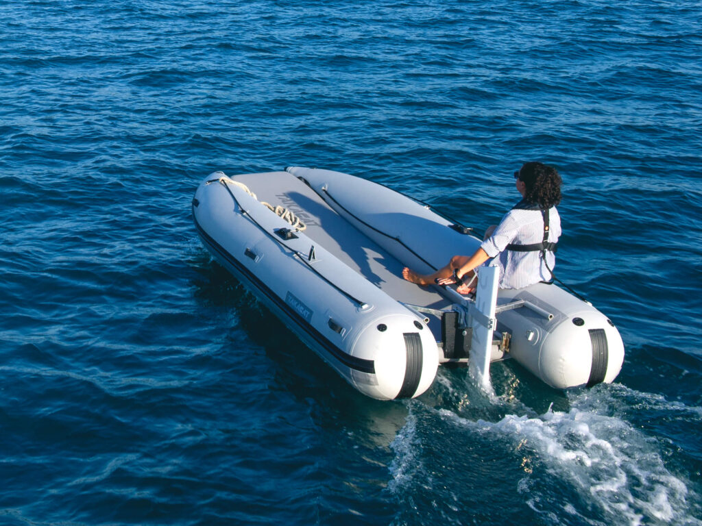 RemigoOne electric outboard motor on dinghy in the water
