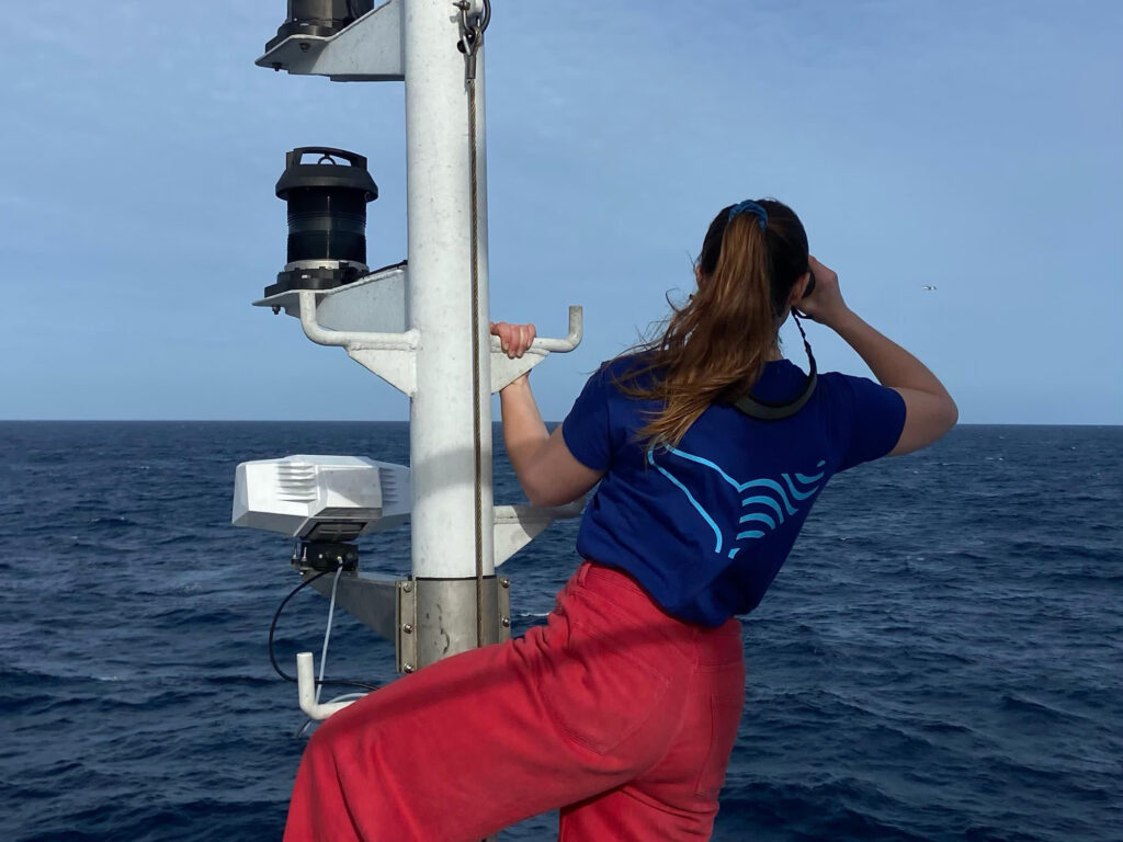 Researcher aboard a vessel