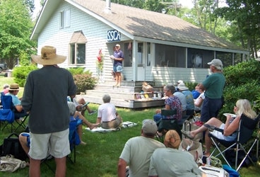 SSCA368 Richard de Grasse welcomes guests to the Seven Seas Cruising Association's annual Down East Gam, held at his home in Broad Cove, Gilkey Harbor, Islesboro, Maine.
