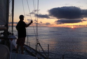 Alvah takes in the rhythm of the sea as the Roger Henry heads to Hawaii.