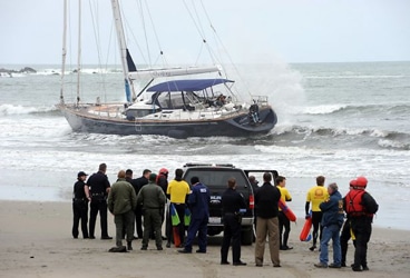 Stolen Sailboat Local and state police gather on the beach as they negotiate with three suspects that onboard a stolen yacht. An 82-foot sailboat stolen from the Sausalito Yacht Harbor ran aground at Linda Mar Beach in Pacifica, CA, Monday March 4th, 2013.