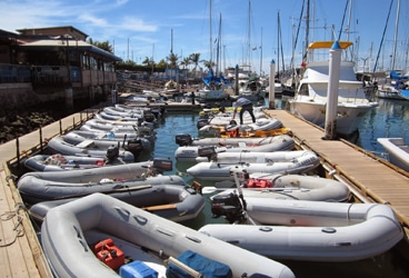 Del Viento- dinghy dock Parking is at a premium lately at the Marina de La Paz dinghy dock. Our yellow dink is diminutive tucked in the middle of the right-side row.