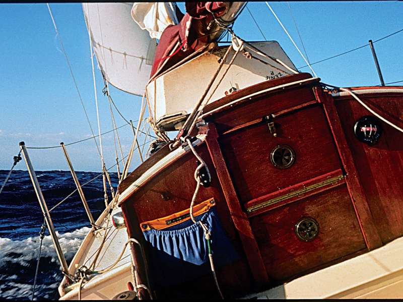 On this Golden Hind 31, the washboards have been connected with a piano hinge, thus enabling the lower board to slide securely in the slots, while the top board can be flipped up or down for ingress or egress.