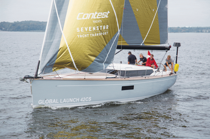 Contest 42CS Sleek lines, twin helms and an aft cockpit set the new Contest 42CS apart from the rest of the company’s line of center-cockpit cruisers. A recessed headsail furler and carbon sprit add to the boat’s sporty look.