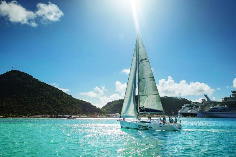 2012 Golden Rock Regatta Boats after the start in Phillipsburg's Great Bay for the around the island of St. Maarten race during the 2012 Golden Rock Regatta. Photo credit ©Bob Grieser/OUTSIDEIMAGES.COM Outside Images Photo Agency