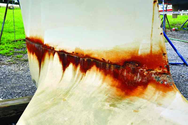 The telltale stains on this keel and bulb are a sign that its steel fasteners are also crevice-corroded.