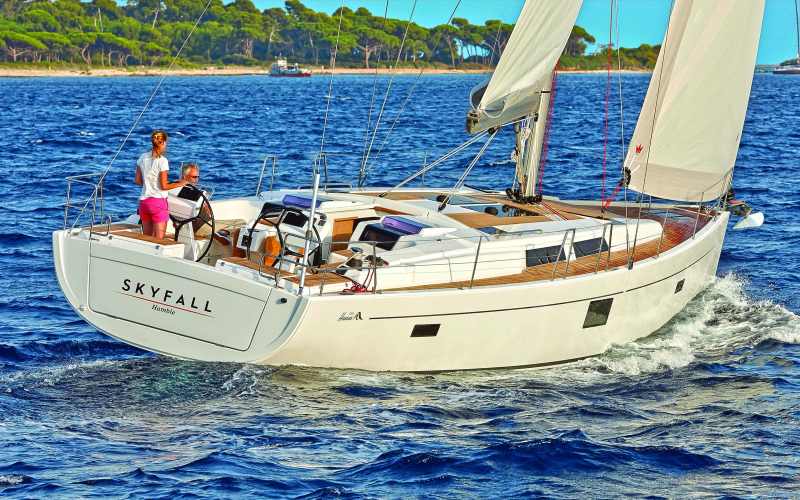 A low-profile cabin house provides excellent visibility of the sails and surroundings from either of the twin helms.