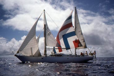Dockside Dismasting After Cloud Nine lost her spar to a freighter while tied up in Rarotonga, we erected a jury rig using the spinnaker pole to extend the main mast, and under this new “schooner” configuration we carried on some 2,000 nautical miles to New Zealand.