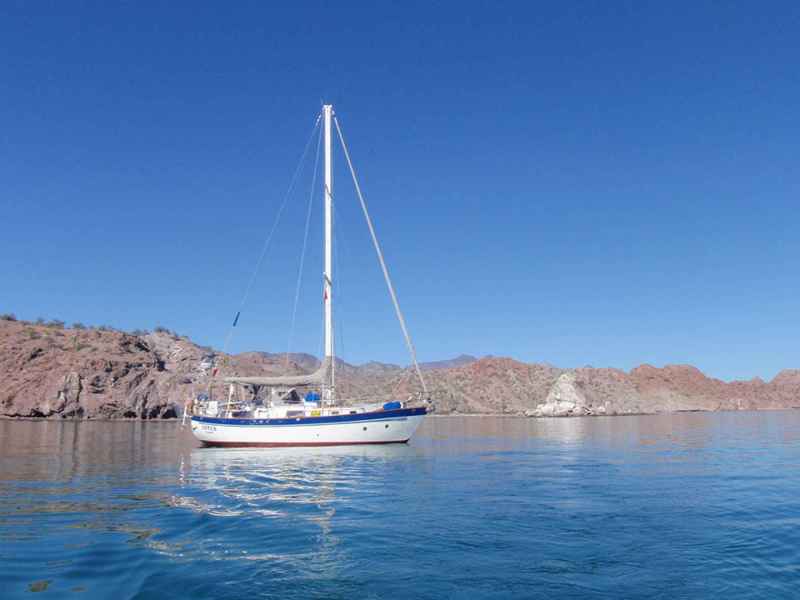 Fantasia 35 Designed for comfort, the Fantasia 35 sports a portly hull and distinctive round portlights. Perhaps most impressive, however, is the fact that it boasts 7 feet of headroom and a layout below-deck that makes larger boats jealous. 3 cabins ensure plenty of berths, while the open interior provides a good mix of comfort and practicality with large amounts of storage. Underway, the Fantasia 35 tends to have noticeable weather helm, especially in earlier models. Click here to read more about the Fantasia 35.