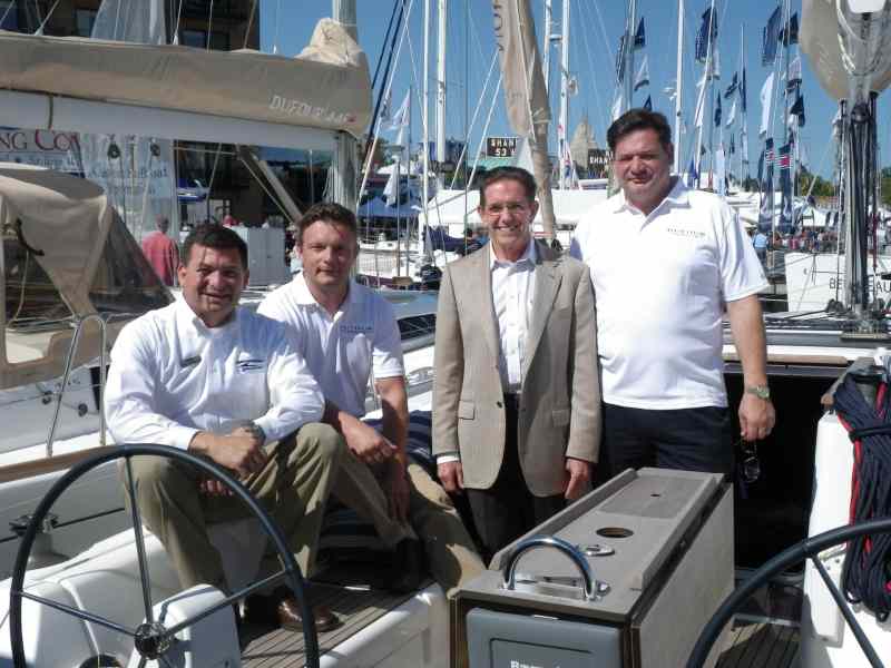 Announcing the launch of MarineMax Vacations are, from left, Raul Bermudez, vice president of MarineMax Vacations, Steve Vernelen, vice president of exports, Dufour, Bill McGill Jr., MarineMax CEO, and Salvatore Serio, Dufour Yachts CEO.