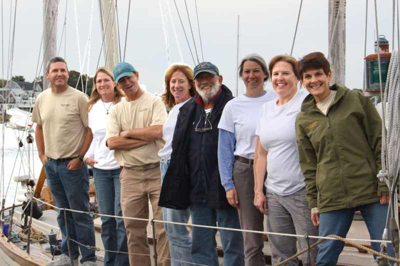 Land’s End Crew The crew of Land’s End sports new gear, a gift from outfitter Lands’ End, at the 2013 wooden boat regatta in Wickford, Rhode Island.