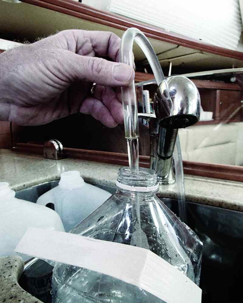 There’s nothing quite like an almost endless supply of clear, fresh water on a long-range cruising boat. For washing the deck and cockpit, we often fill 2.5-gallon jerry jugs directly from the watermaker’s sample tube and carry them topsides to scrub everything clean.
