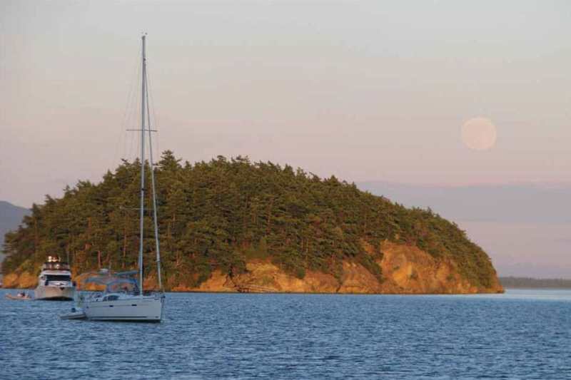 The appearance of the Super Moon on the summer solstice was a visual treat that kept the shutterbugs in the flotilla fleet busy long into the night.