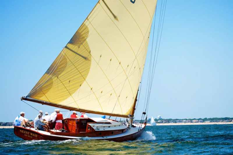 Silent Maid kicks up quite the bow wave as she cuts through waters off Bay Head, New Jersey, in the 32nd annual Squan Tri-Sail Offshore Regatta in July, 2011.