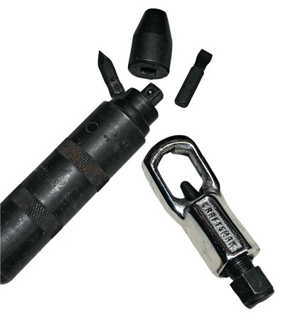 Impact driver Tools of the trade for the rusty-hardware warrior: The impact driver (left), with attachments, can impart significant turning force to free stuck nuts and bolts. Craftsman’s Nut Cracker (right) is a last-resort weapon. In practice, the Nut Cracker will destroy the nut, though the stud or bolt may survive.