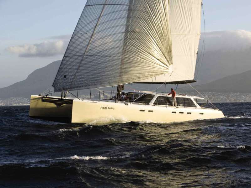 CRW0722_FEA1_01_edit Catamaran sailing off Cape Town's Table Mountain