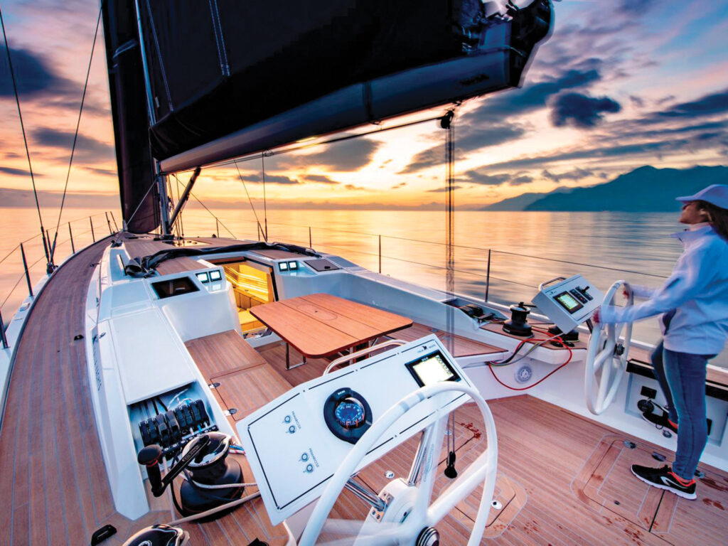 Woman sailing the Italia Yachts 14.98