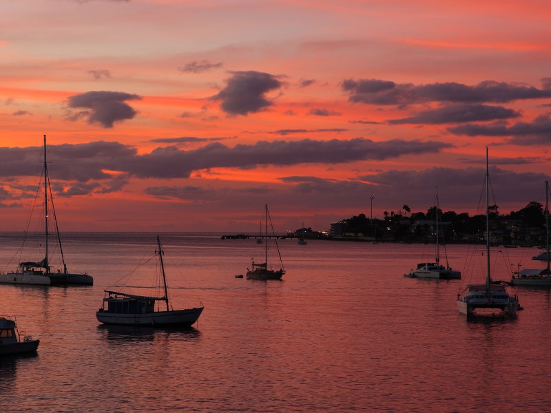 Sunset over Dominica Sunset over ocean on Dominica in the Caribbean with red sky in background