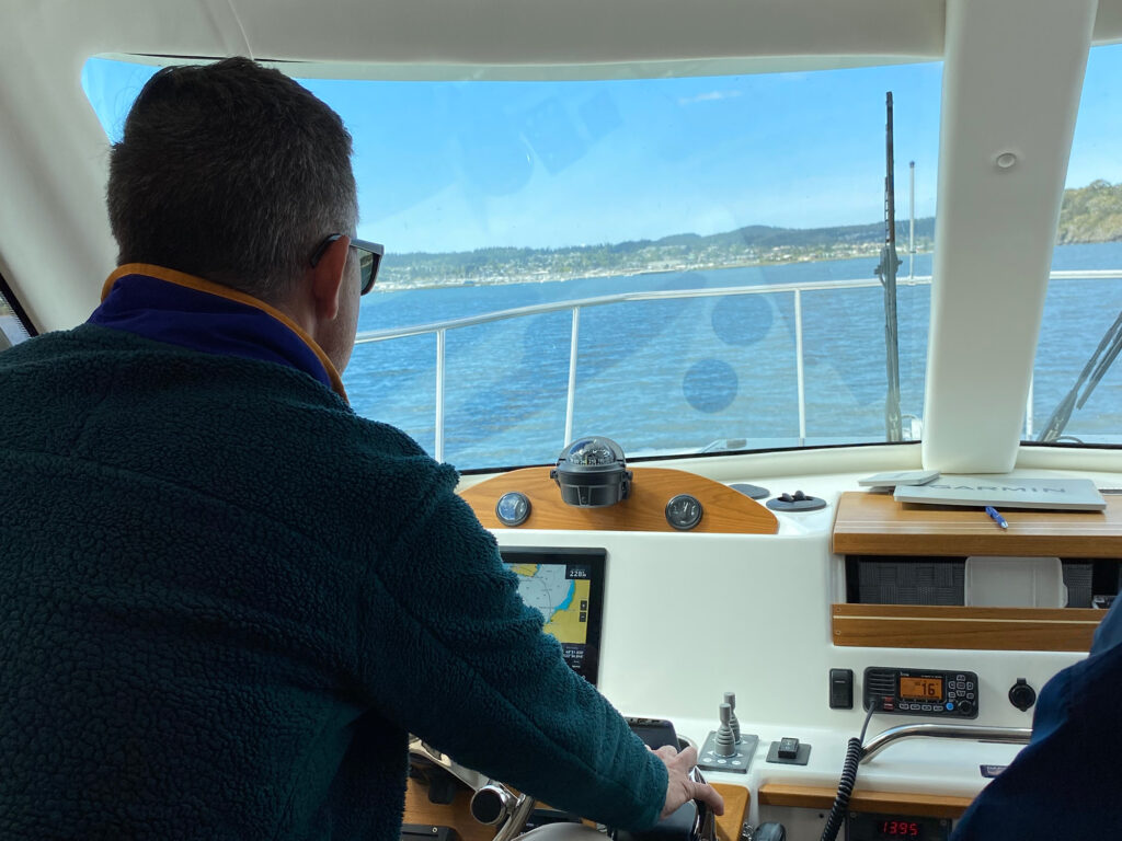 Man behind the controls of a ship