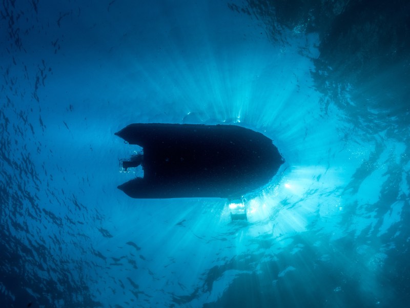 light below the surface Dingy on the water