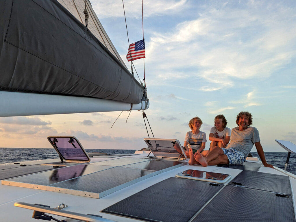 Family onboard their Nautitech
