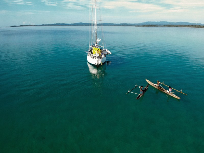 Canoes coming out to greet the author