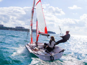 women sailing in the ocean