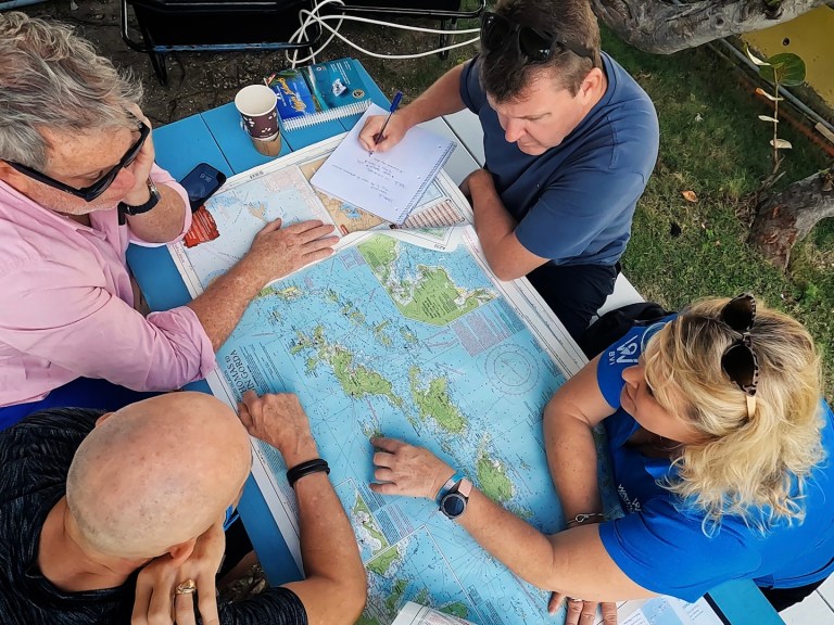 Photo Credit Waypoints Yacht Charters – Chart your own course with Waypoints (1) People charting a sailing trip
